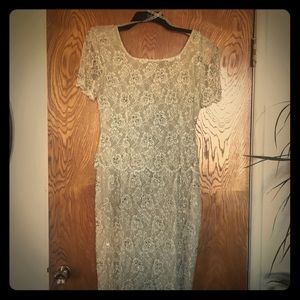 Elegant beaded gown. Size 8 Mother of the Bride a few beads are missing.